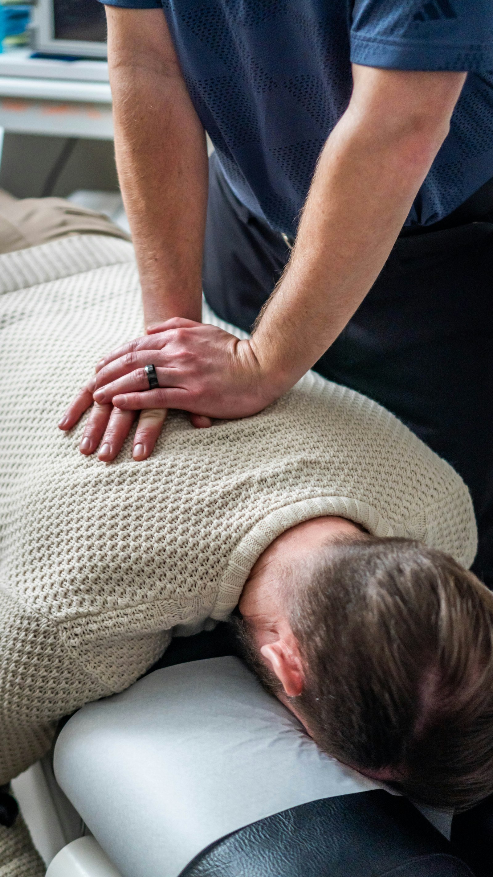 Gentle hands-on chiropractic adjustment at Providence Family Chiropractic